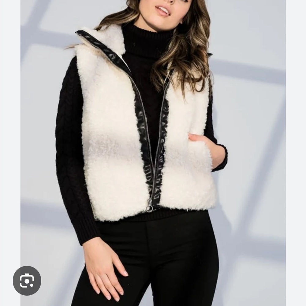 Sherpa Vest Cream Cozy vest with faux black leather